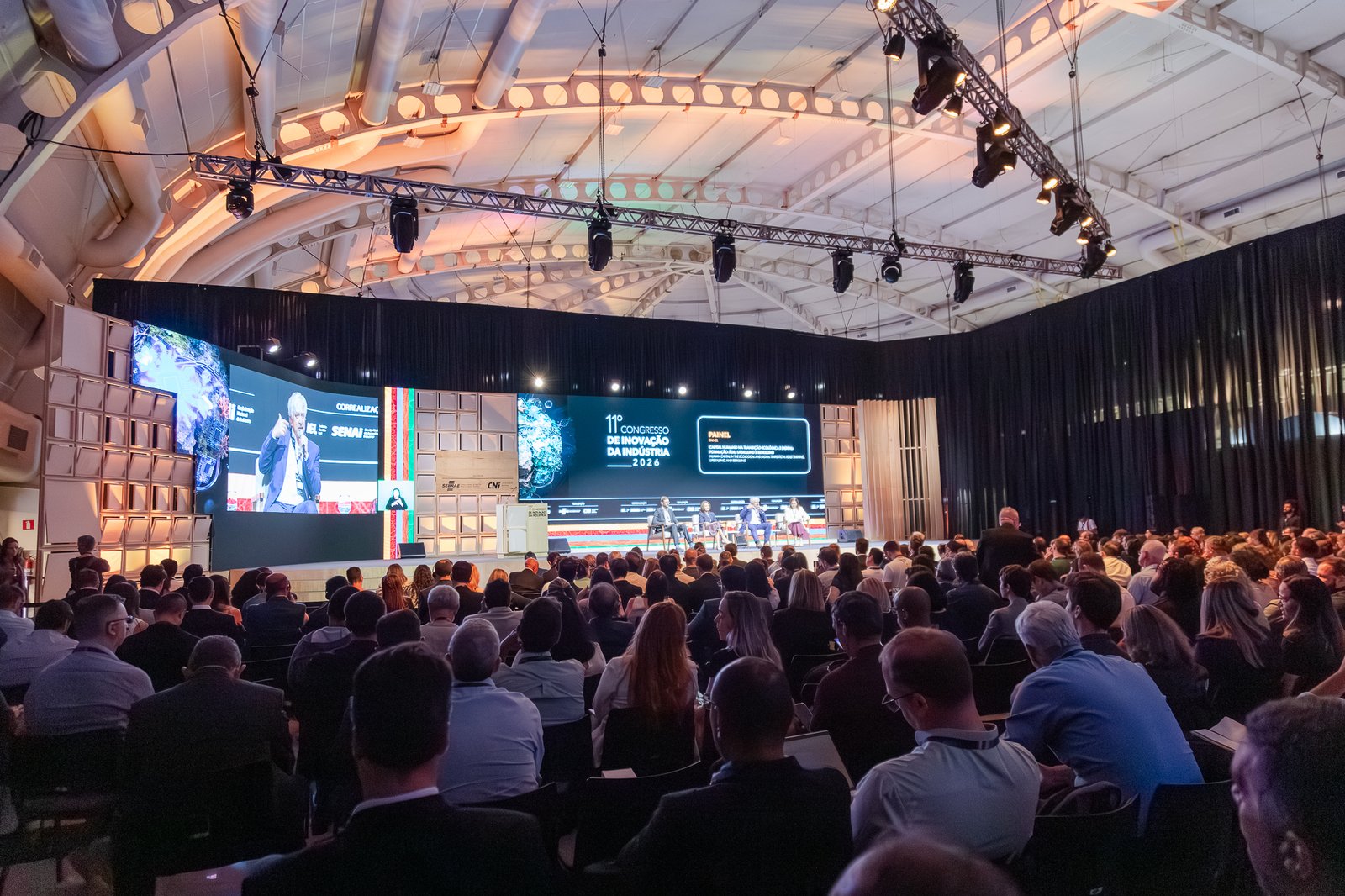 Evento corporativo no WTC Events Center com soluções sustentáveis e gestão consciente de recursos.